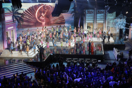 The contestants pose on stage as the Miss Universe pageant begins in Miami, Sunday, Jan. 25, 2015. (AP Photo/Alan Diaz)