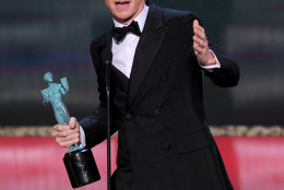 Eddie Redmayne accepts the award for outstanding performance by a male actor in a leading role for The Theory of Everything at the 21st annual Screen Actors Guild Awards at the Shrine Auditorium on Sunday, Jan. 25, 2015, in Los Angeles. (Photo by Vince Bucci/Invision/AP)