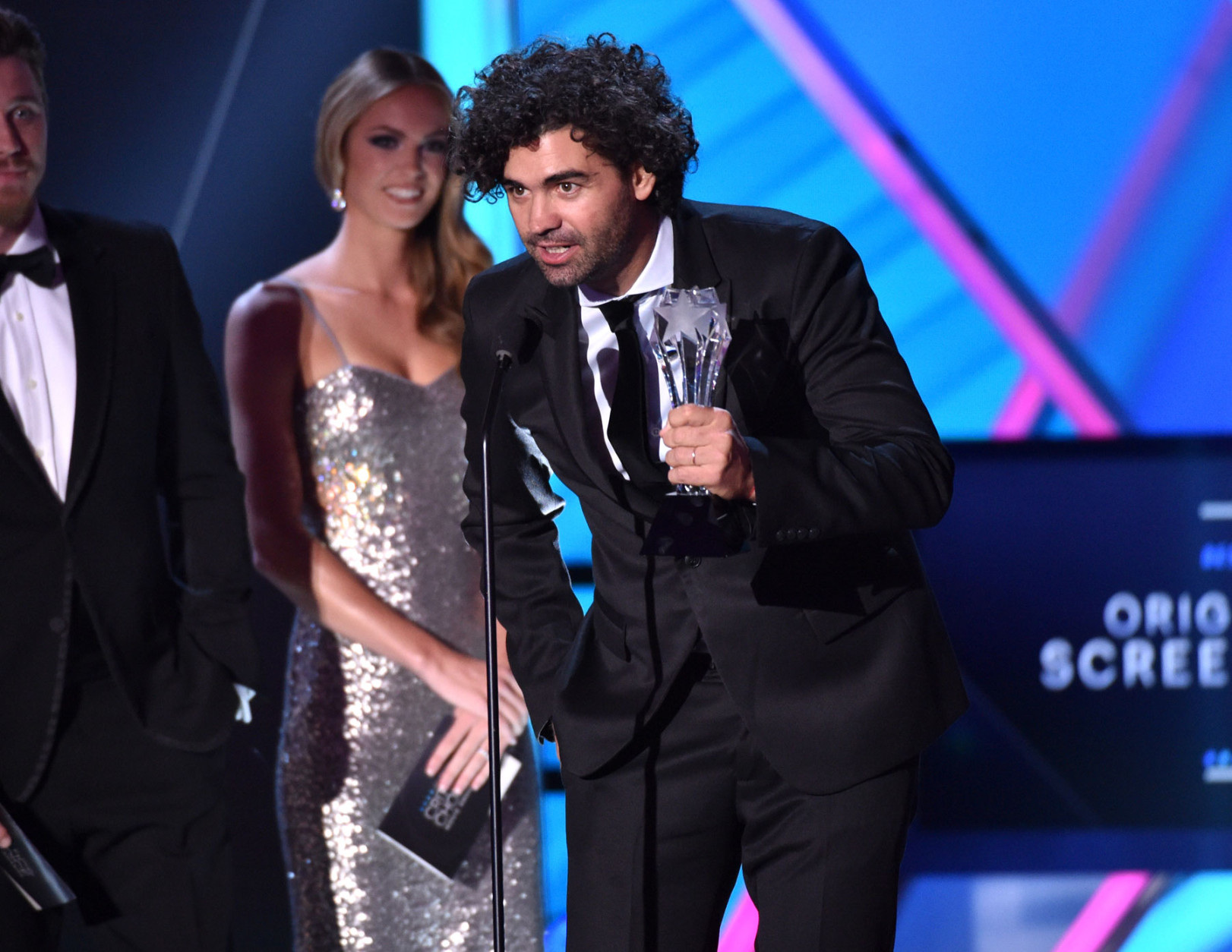 Armando Bo accepts the best original screenplay award for “Birdman” at the 20th annual Critics' Choice Movie Awards at the Hollywood Palladium on Thursday, Jan. 15, 2015, in Los Angeles. (Photo by John Shearer/Invision/AP)