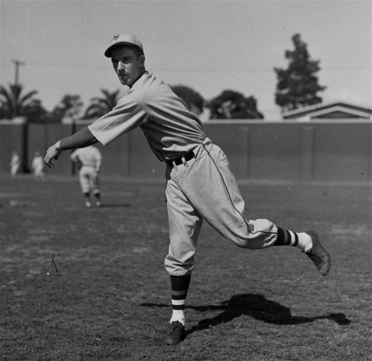 New York Giants pitcher Carl Hubbell, known as the king of the screwball, throws a warmup pitch in 1932.