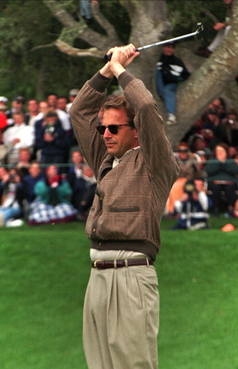 Kevin Costner, who starred in Tin Cup the year prior, celebrates after a made shot in 1997. (AP Photo/Olga Shalygin)