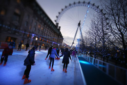 London Eye (EDITORS NOTE: This image has been processed with digital filters). LONDON, ENGLAND - DECEMBER 15: (EDITORS NOTE: This image has been processed with digital filters). People skate on the ice rink near The London Eye on December 15, 2014 in London, England. Currently 12 seasonal ice rinks function during winter in London. (Photo by Peter Macdiarmid/Getty Images)