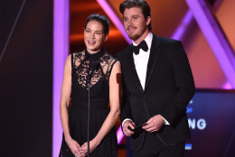 Michelle Monaghan, left, and Garrett Hedlund present the best song award at the 20th annual Critics' Choice Movie Awards at the Hollywood Palladium on Thursday, Jan. 15, 2015, in Los Angeles. (Photo by John Shearer/Invision/AP)