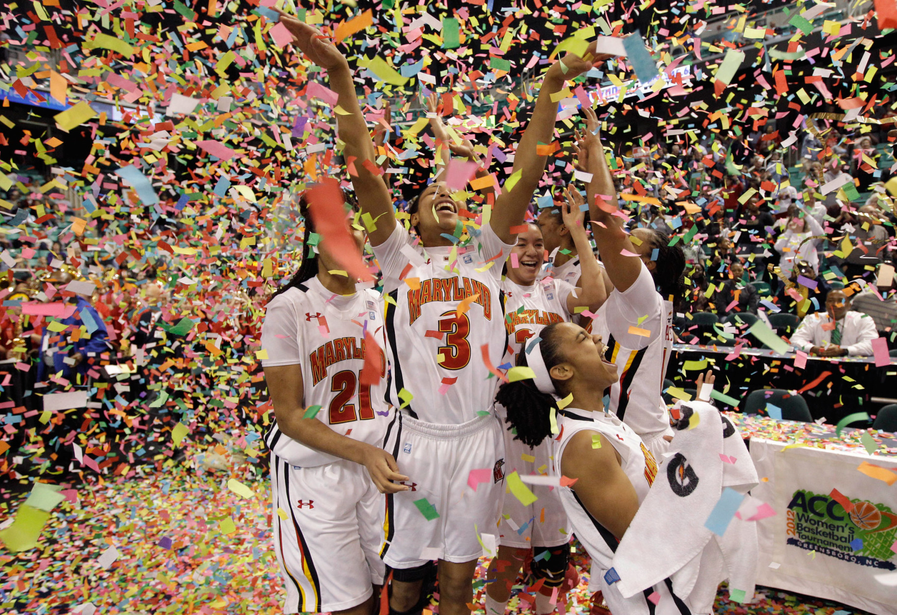 Maryland's Brene Moseley, center, Tianna Hawkins, left, and Sequoia Austin, right, celebrate their 68-65 win over Georgia Tech in the NCAA Atlantic Coast Conference women's college tournament basketball championship game, Sunday, March 4, 2012, in Greensboro, N.C. (AP Photo/Chuck Burton)