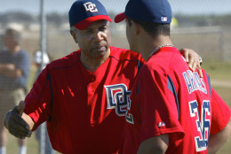 Manager Frank Robinson tutors pitcher Tony Armas, Jr. at the first Washington Nationals Spring Training in 2005. (AP Photo/Lawrence Jackson)