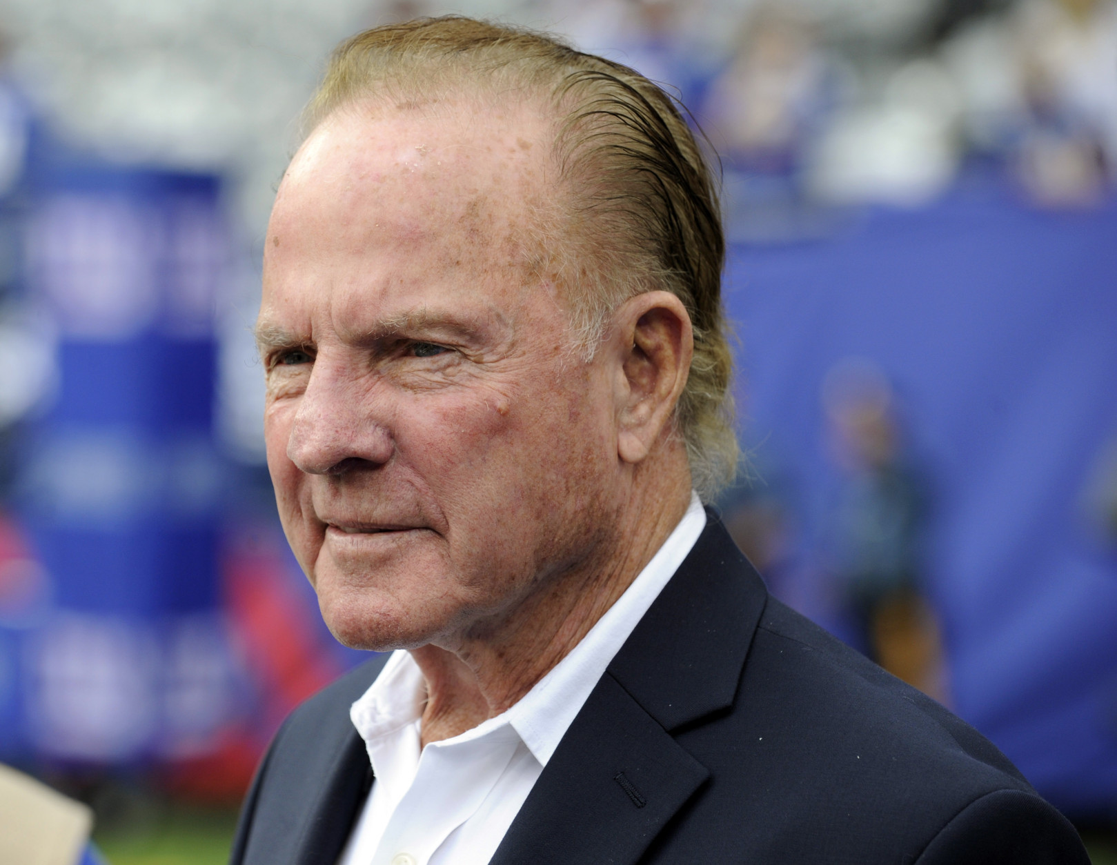 FILE - In this Sept. 15, 2013 file photo, former New York Giants player Frank Gifford looks on before an NFL football game between the New York Giants and the Denver Broncos in East Rutherford, N.J. Gifford's family on Sunday, Aug. 9, 2015 said Gifford died suddenly of natural causes. He was 84. (AP Photo/Bill Kostroun, File)
