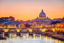 View on Tiber and St. Peter's cathedral at night, Rome. (Thinkstock)