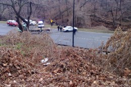 On Sunday, a motorist drove her vehicle off Rock Creek Parkway and into shallow water. She was taken to a local hospital for observation. (WTOP/Dennis Foley)