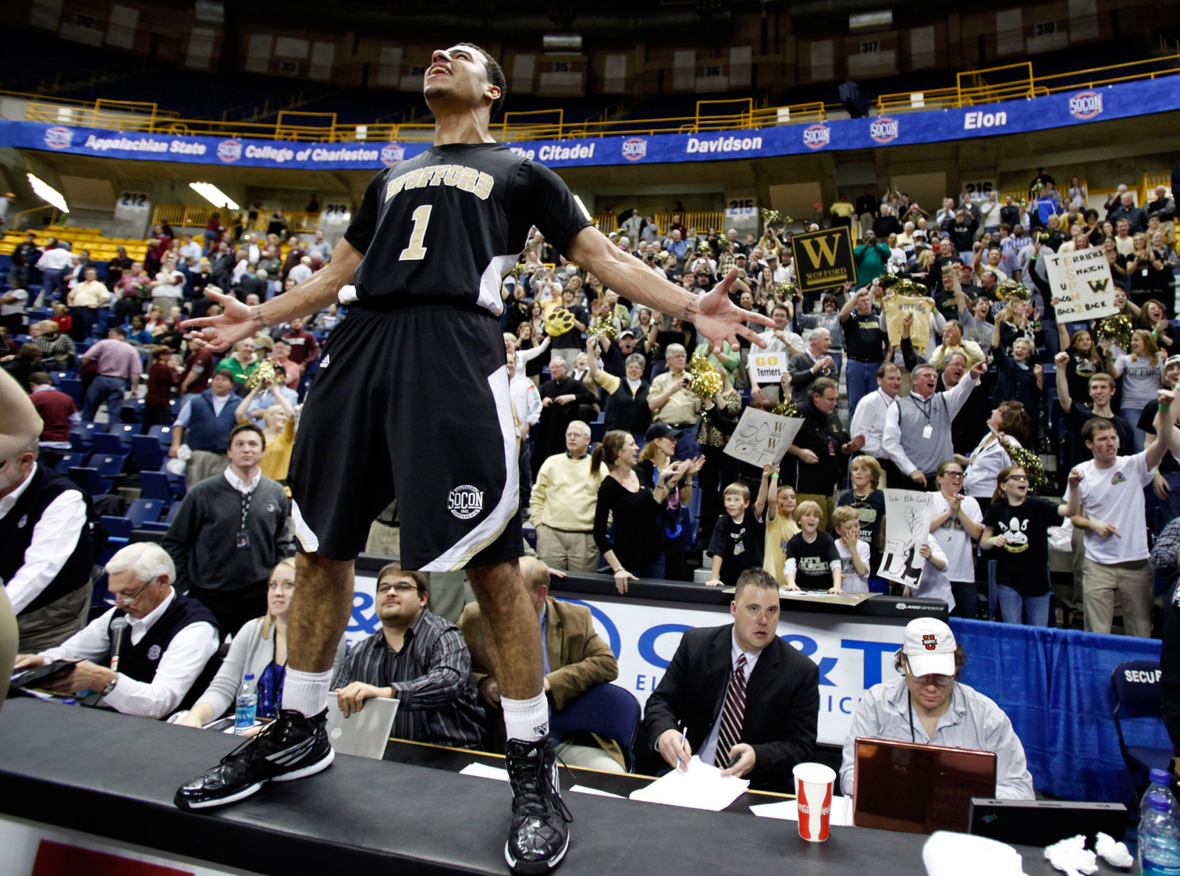 Wofford guard Cameron Rundles lets out a yell after Wofford defeated College of Charleston 77-67 in an NCAA college basketball game to win the Southern Conference tournament Monday, March 7, 2011, in Chattanooga, Tenn. Rundles led Wofford with 21 points. (AP Photo/Mark Humphrey)