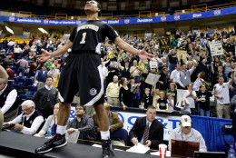 Wofford guard Cameron Rundles lets out a yell after Wofford defeated College of Charleston 77-67 in an NCAA college basketball game to win the Southern Conference tournament Monday, March 7, 2011, in Chattanooga, Tenn. Rundles led Wofford with 21 points. (AP Photo/Mark Humphrey)