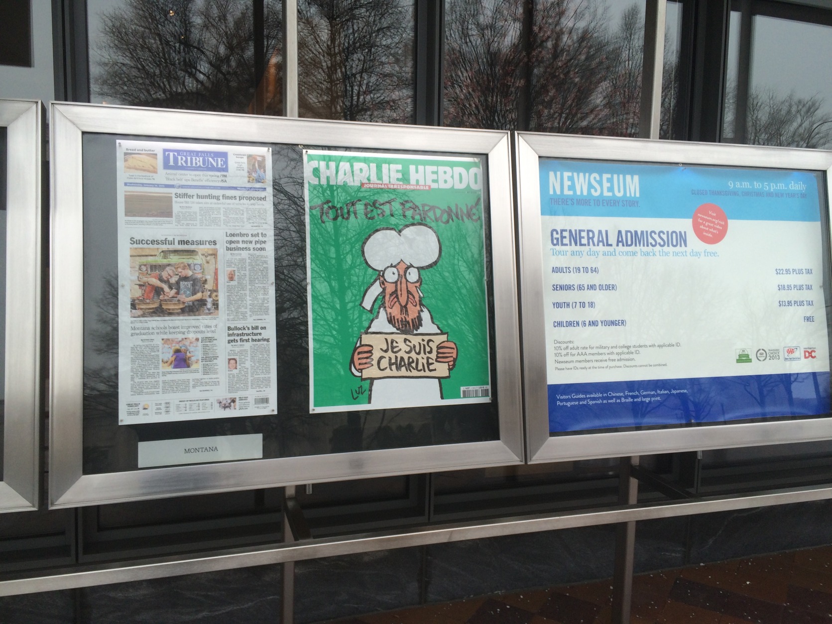 The Newseum in Washington, D.C.. displays the controversial Charlie Hebdo cover on Wednesday, Jan. 14. 