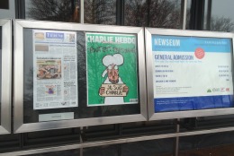 The Newseum in Washington, D.C.. displays the controversial Charlie Hebdo cover on Wednesday, Jan. 14. 