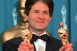 James Horner displays Oscars he won for Original Song and Original Dramatic Score for "Titanic,"at the 70th Academy Awards at the Shrine Auditorium in Los Angeles Monday, March 23, 1998.(AP Photo/Reed Saxon)