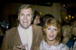 FILE - In this Tuesday, Sept. 13, 1983 file photo, actors Judy Carne and Alan Sues, left, of "Rowan And Martin's Laugh-In" are shown during a "Laugh-In" reunion party, in Los Angeles. Laugh-In star Judy Carne has died in a British hospital. She was 76. She was famous for popularizing the Sock it to Me phrase on the hit TV show that started in the late 1960s. Her death was confirmed Tuesday, Sept. 8, 2015 in an e-mail by Eva Duffy, spokeswoman for Northampton General Hospital. Duffy said Carne died in the hospital on September 3. Newspaper reports said she had suffered from pneumonia. (AP Photo/Doug Pizac, file)