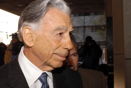 WILMINGTON, DE - DECEMBER 2:  Billionaire investor Kirk Kerkorian arrives at the J. Caleb Boggs Federal Building to testify in his lawsuit against Daimler Chrysler AG December 2, 2003 in Wilmington, Delaware. Kerkorian, whose Tracinda Corp. was Chrysler's largest shareholder until it merged with Daimler-Benz, alledges that Daimler-Benz officials commited fraud during merger talks in 1998.  (Photo by William Thomas Cain/Getty Images)