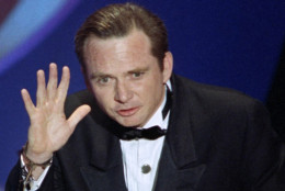 FILE - This March 26, 1991 file photo shows Michael Blake accepting the Oscar for best adapted screenplay for "Dances with Wolves" at the 63rd Annual Academy Awards in Los Angeles. Blake's business partner, Daniel Ostroff, says the 69-year-old died Saturday in Tucson, Ariz., after a long battle with cancer.  (AP Photo/Reed Saxon, File)
