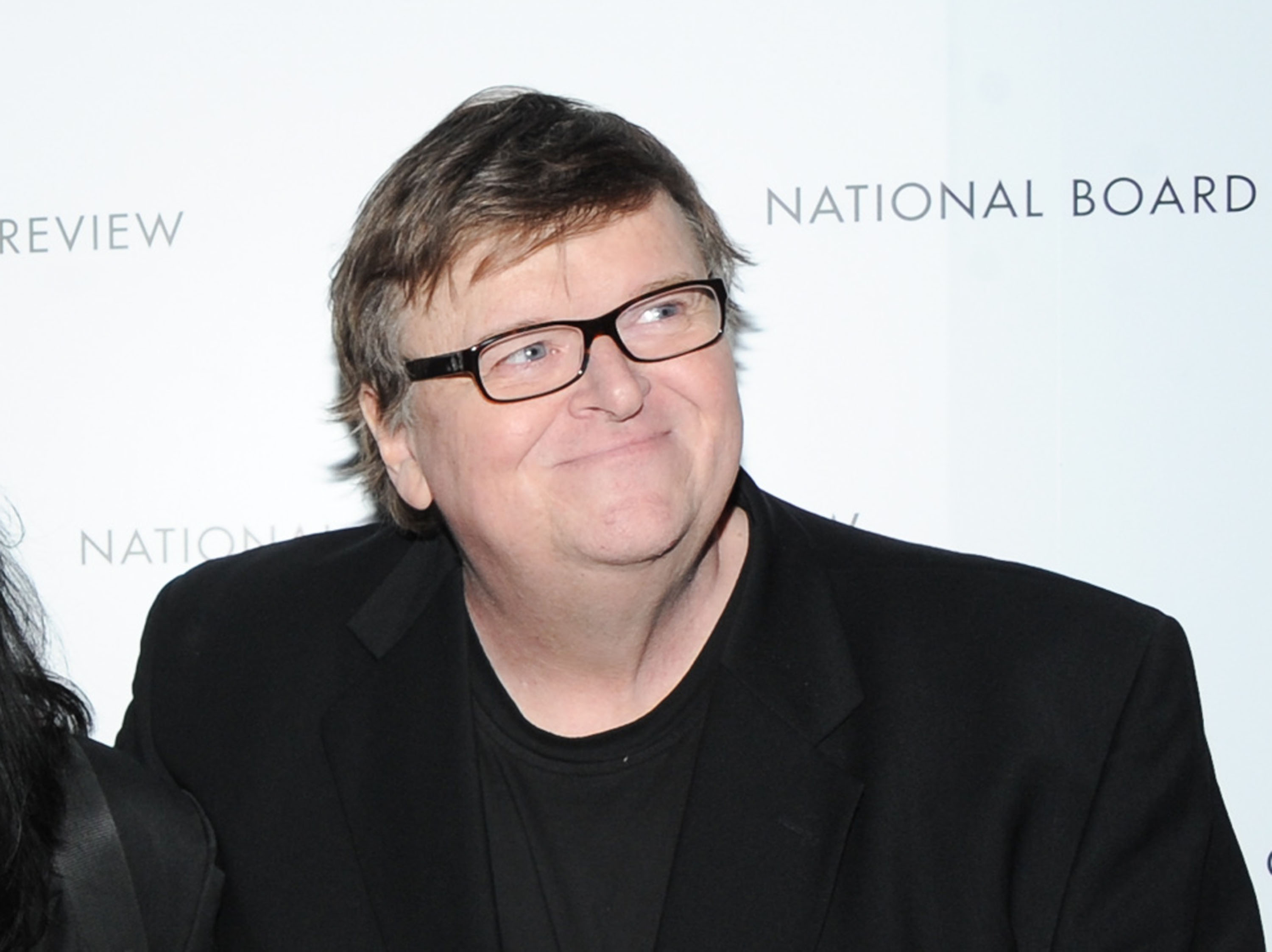Michael Moore, Seth Rogen snipe at ‘American Sniper’