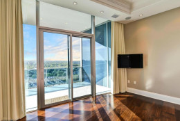 The penthouse at Turnberry Tower features a wraparound balcony and private elevator. (MRIS Homes)