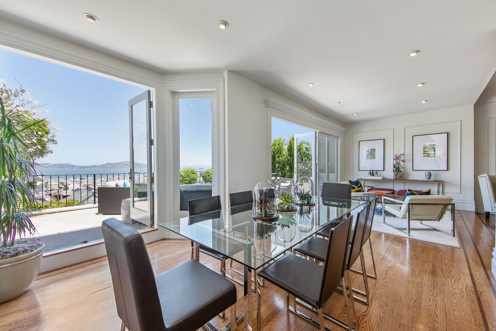 The house has wide views of the bay, curving stairwell and light hardwood floors. (Jason Wakefield/TopTenRealEstate)