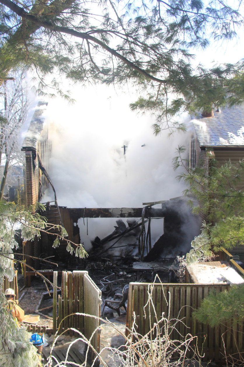 A fire caused structural damage to a townhouse on Ring Dover Lane in Columbia, Maryland, and damaged an adjoining home Thursday, Feb. 19, 2015. (Courtesy Howard County Fire and Rescue Services)