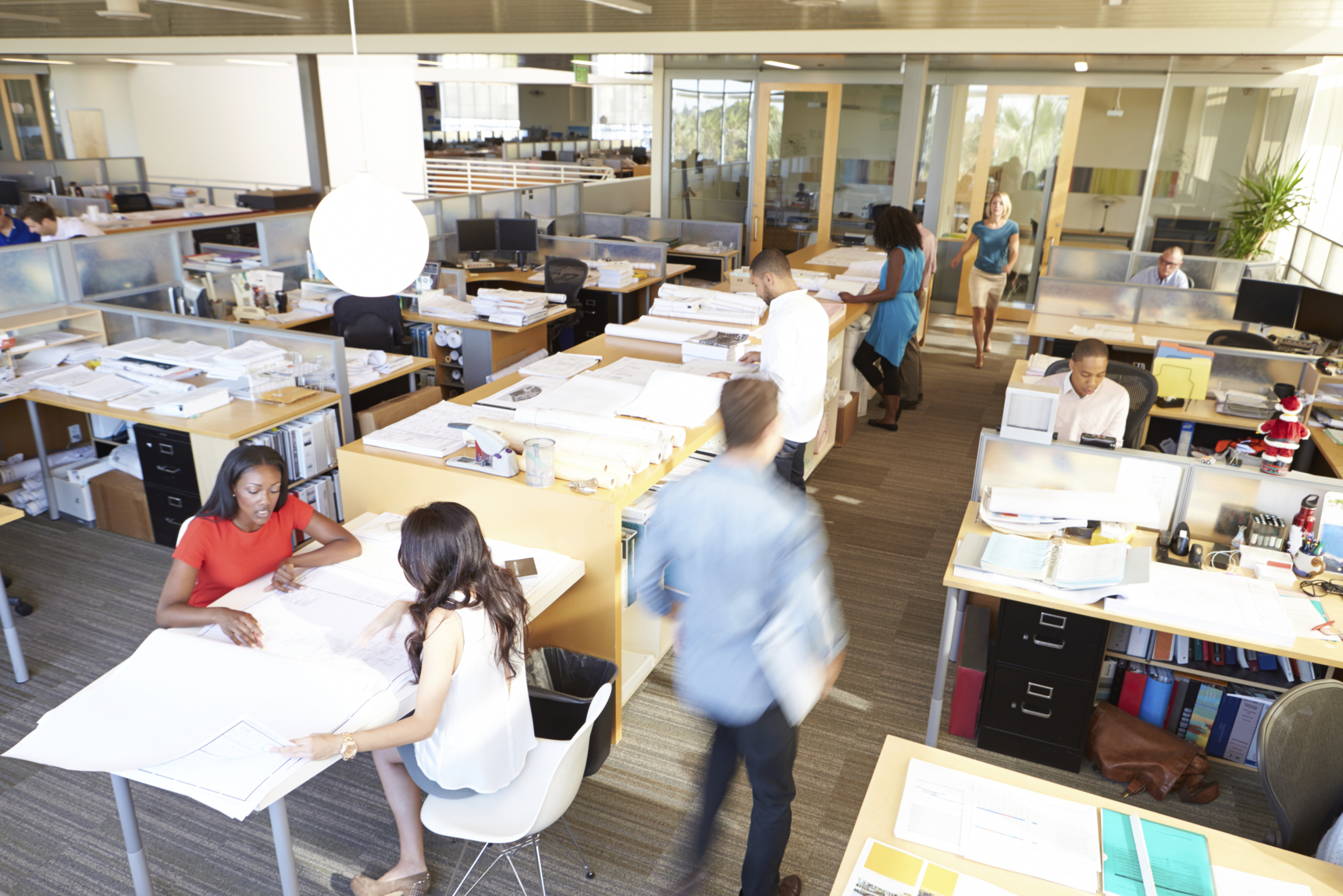 Shrinking employee work space may have advantages