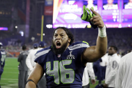 Seattle Seahawks fullback Will Tukuafu (46) reacts against the New England Patriots during the second half of NFL Super Bowl XLIX football game Sunday, Feb. 1, 2015, in Glendale, Ariz. (AP Photo/David Goldman)