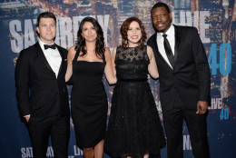 Colin Jost, from left, Cecily Strong, Vanessa Bayer and Michael Che arrive at the Saturday Night Live 40th Anniversary Special at Rockefeller Plaza on Sunday, Feb. 15, 2015, in New York. (Photo by Evan Agostini/Invision/AP)