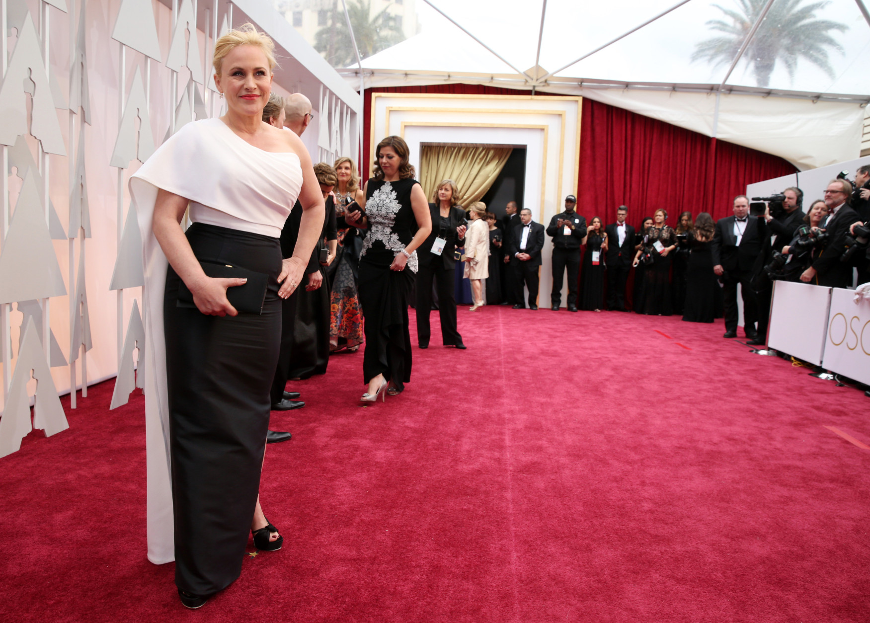 Patricia Arquette arrives at the Oscars on Sunday, Feb. 22, 2015, at the Dolby Theatre in Los Angeles. (Photo by Matt Sayles/Invision/AP)