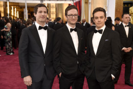 Andy Samberg, and from left, Akiva Schaffer and Jorma Taccone arrive at the Oscars on Sunday, Feb. 22, 2015, at the Dolby Theatre in Los Angeles. (Photo by Chris Pizzello/Invision/AP)