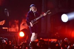 Angus Young, of AC/DC, performs at the 57th annual Grammy Awards on Sunday, Feb. 8, 2015, in Los Angeles. (Photo by John Shearer/Invision/AP)
