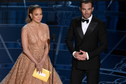 Jennifer Lopez, left, and Chris Pine present the award for best costume design at the Oscars on Sunday, Feb. 22, 2015, at the Dolby Theatre in Los Angeles. (Photo by John Shearer/Invision/AP)