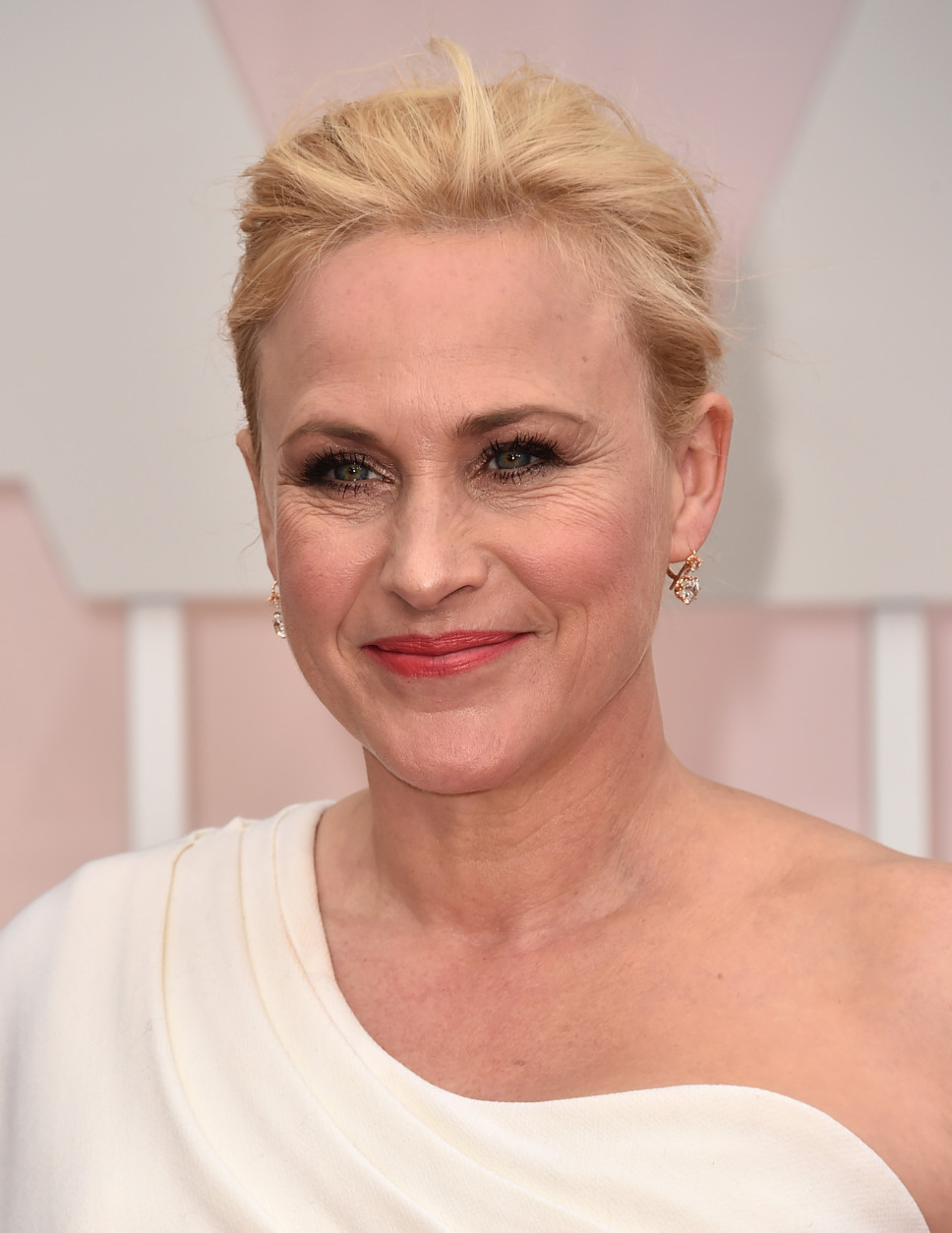 Patricia Arquette arrives at the Oscars on Sunday, Feb. 22, 2015, at the Dolby Theatre in Los Angeles. (Photo by Jordan Strauss/Invision/AP)
