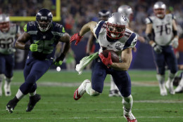 New England Patriots wide receiver Julian Edelman (11) runs during the second half of NFL Super Bowl XLIX football game against the Seattle Seahawks Sunday, Feb. 1, 2015, in Glendale, Ariz. (AP Photo/Mark Humphrey)