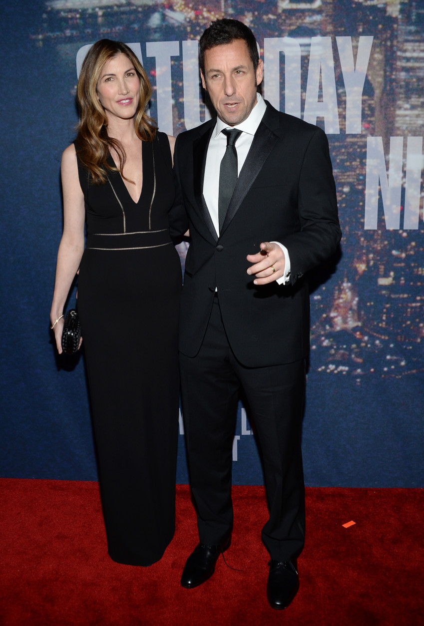 Jackie Sandler, left, and Adam Sandler arrive at the Saturday Night Live 40th Anniversary Special at Rockefeller Plaza on Sunday, Feb. 15, 2015, in New York. (Photo by Evan Agostini/Invision/AP)