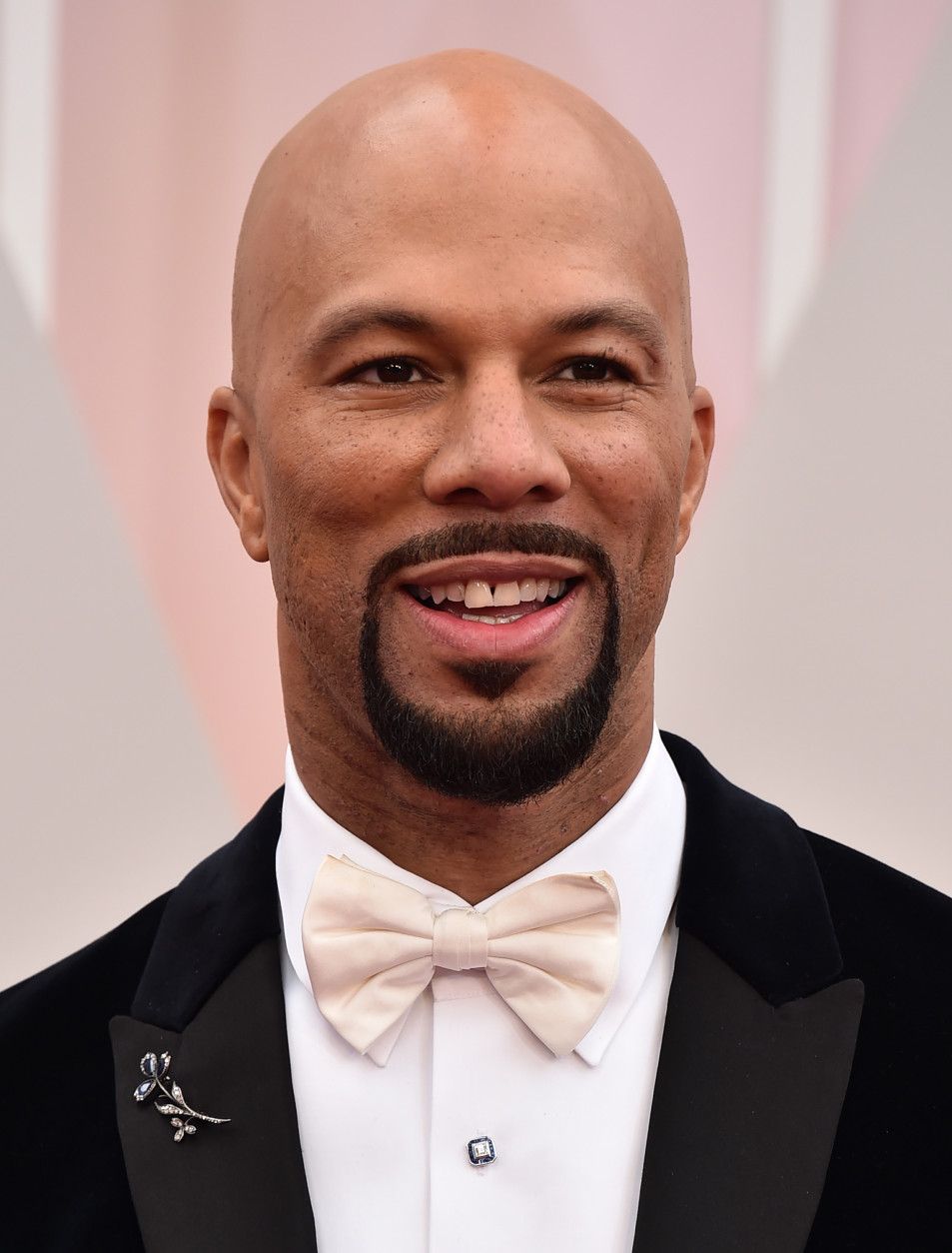 Common arrives at the Oscars on Sunday, Feb. 22, 2015, at the Dolby Theatre in Los Angeles. (Photo by Jordan Strauss/Invision/AP)