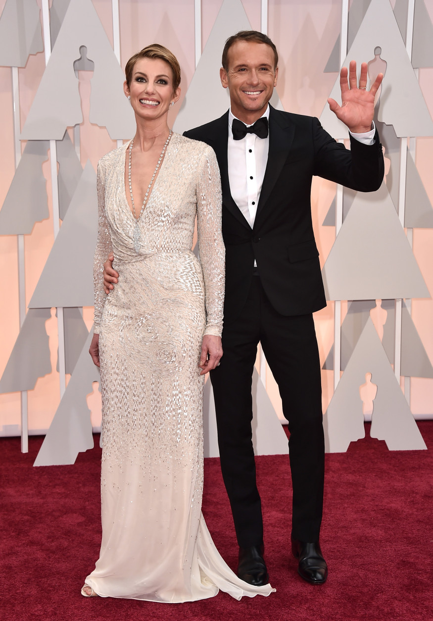 Faith Hill, left, and Tim McGraw arrive at the Oscars on Sunday, Feb. 22, 2015, at the Dolby Theatre in Los Angeles. (Photo by Jordan Strauss/Invision/AP)