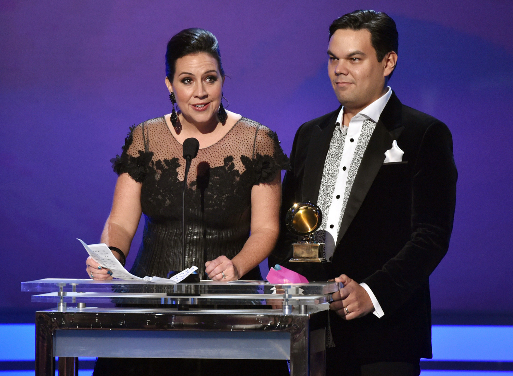 Kristen Anderson-Lopez, left, and Robert Lopez accept the award for best song written for visual media for Let It Go at the 57th annual Grammy Awards on Sunday, Feb. 8, 2015, in Los Angeles. (Photo by John Shearer/Invision/AP)