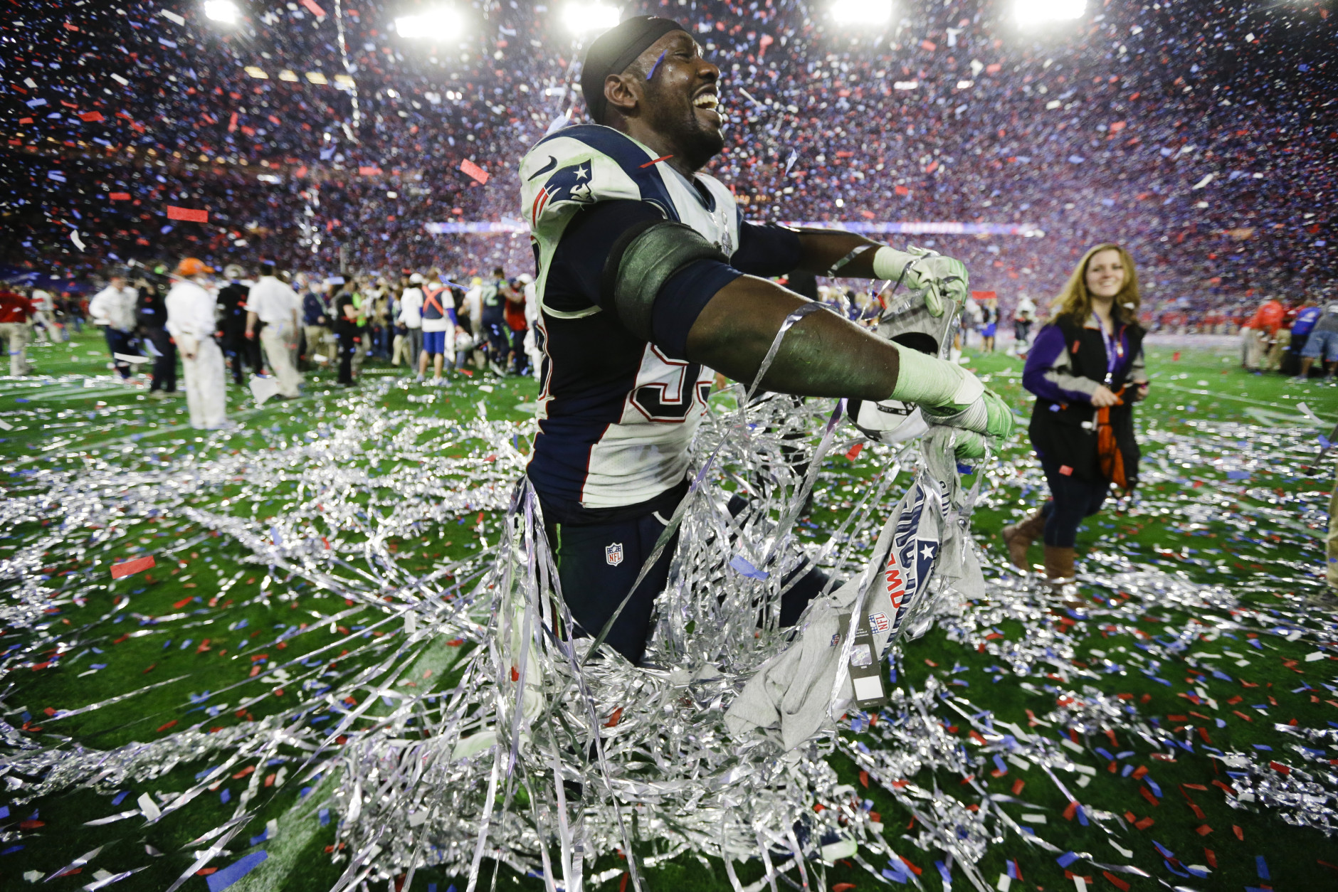 New England Patriots defensive end Chandler Jones (95) celebrates after the NFL Super Bowl XLIX football game  against the Seattle Seahawks Sunday, Feb. 1, 2015, in Glendale, Ariz. The Patriots won the game 28-24. (AP Photo/Ben Margot)
