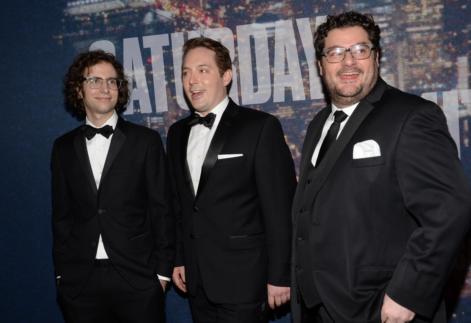 Kyle Mooney, from left, Beck Bennett and Bobby Moynihan arrive at the Saturday Night Live 40th Anniversary Special at Rockefeller Plaza on Sunday, Feb. 15, 2015, in New York. (Photo by Evan Agostini/Invision/AP)
