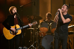 Beck, left, and Chris Martin perform at the 57th annual Grammy Awards on Sunday, Feb. 8, 2015, in Los Angeles. (Photo by John Shearer/Invision/AP)