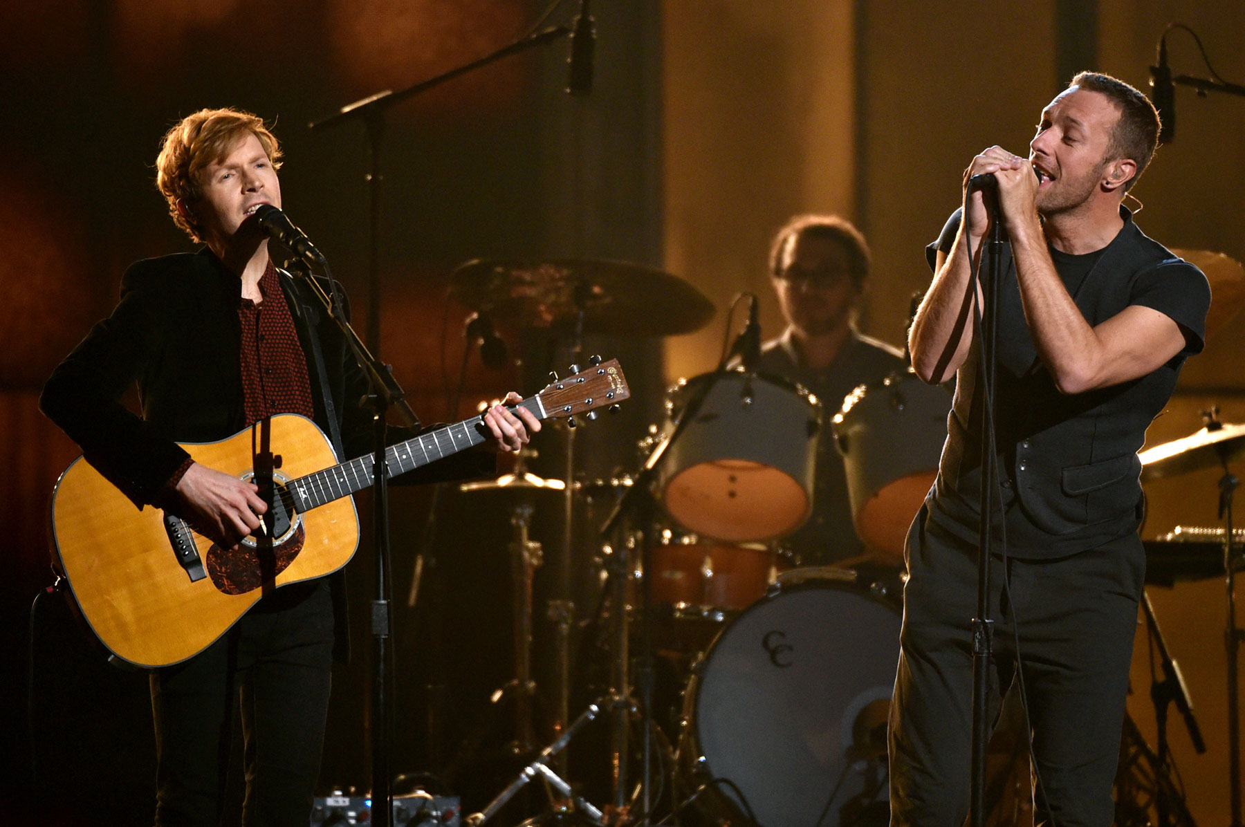 Beck, left, and Chris Martin perform at the 57th annual Grammy Awards on Sunday, Feb. 8, 2015, in Los Angeles. (Photo by John Shearer/Invision/AP)