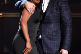 Mary J. Blige, left, and Sam Smith embrace at the 57th annual Grammy Awards on Sunday, Feb. 8, 2015, in Los Angeles. (Photo by John Shearer/Invision/AP)