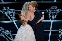 Lady Gaga, left, and Julie Andrews embrace at the Oscars on Sunday, Feb. 22, 2015, at the Dolby Theatre in Los Angeles. (Photo by John Shearer/Invision/AP)