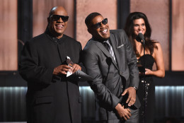 Stevie Wonder, left, and Jamie Foxx present the award for record of the year at the 57th annual Grammy Awards on Sunday, Feb. 8, 2015, in Los Angeles. (Photo by John Shearer/Invision/AP)