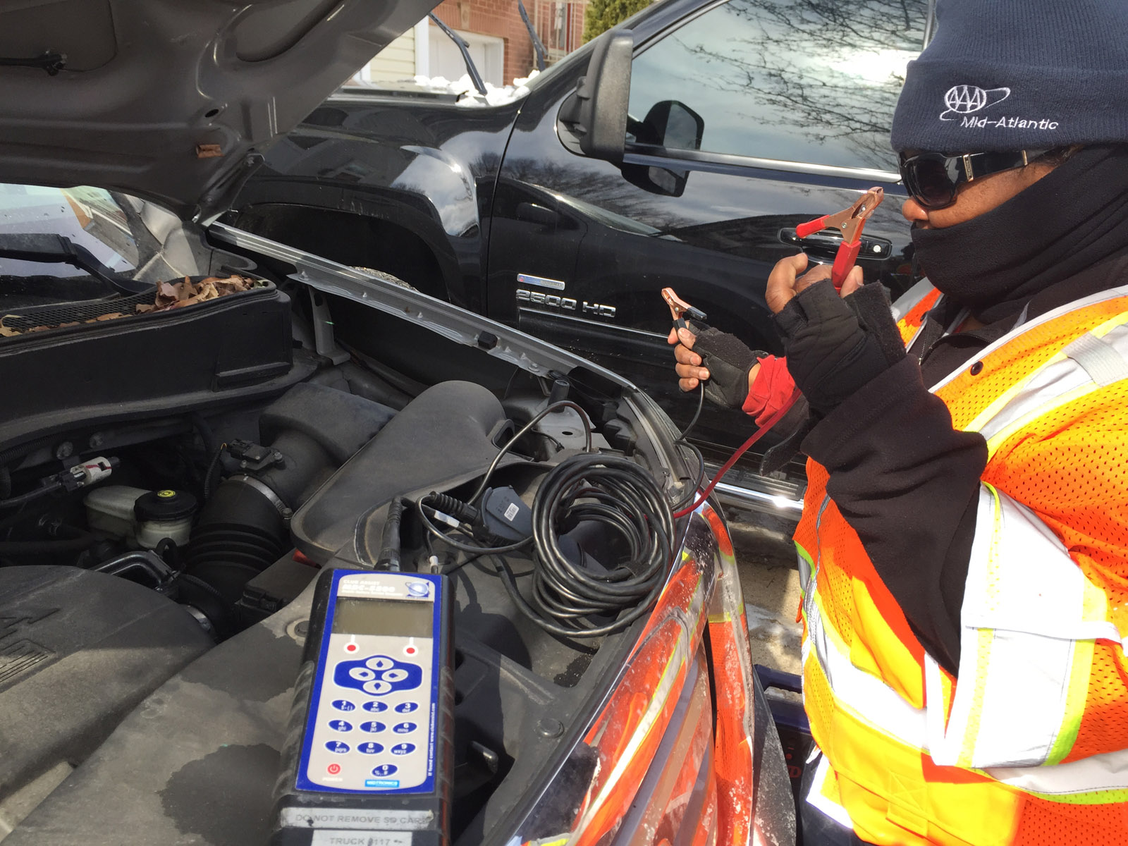 Jones runs some diagnostics to determine if the battery needs to be replaced.  (WTOP/Andrew Mollenbeck)