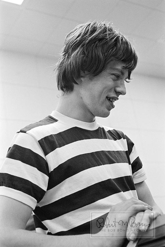 In this candid photograph of the Rolling Stones frontman, Mick Jagger, taken by the Stones US Tour Manager, Bob Bonis, the entertainer becomes the entertained in this private moment during one of the Rolling Stones’ recording sessions at RCA Studios in Hollywood, California . Once a rather shy lad, Mick fell in love with performing when he realized the girls were, as he told Rolling Stone, “going, either quietly or loudly, sort of crazy.” Here, the future legend’s boyish charm is on full display. (Bob Bonis/Ebay)