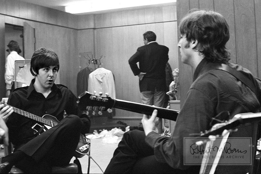 In a candid moment of true backstage access, Paul McCartney and John Lennon warm up on their guitars in anticipation of their show at Olympia Stadium in Detroit, Michigan, on August 13, 1966. The two-show stop in Detroit drew a combined audience of 30,800 rabid Beatles fans and had an impressive set list: Rock and Roll Music, She’s a Woman, If I Needed Someone, Baby’s In Black, Day Tripper, I Feel Fine, Yesterday, I Wanna Be Your Man, Nowhere Man, Paperback Writer and Long Tall Sally. In this photograph, the creative energy between Lennon and McCartney is palpable. The legendary duo collaborated on some of the biggest records the world has ever seen, and did it all with a healthy amount of friendly competition. A writer for The Atlantic summed up their partnership best: “John was the badass older brother Paul never had. Paul was a charming sidekick who could do something rare: keep up with John.” The pair are notorious for their own version of call-and-answer: John’s Strawberry Fields Forever was answered by Paul’s Penny Lane; John’s Revolution 1 by Paul’s Blackbird. And so, one of the greatest songwriting duos of all time was created - in competition and in brotherhood - and captured beautifully here.