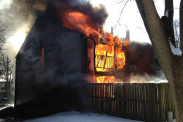 A fire engulfs a townhouse on Ring Dover Lane in Columbia, Maryland. Winds spread the flames to an adjoining home Thursday, Feb. 19, 2015. (Courtesy Howard County Fire and Rescue Services)