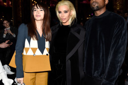 PARIS, FRANCE - MARCH 05:  (L-R) Miroslava Duma, Kim Kardashian and Kanye West attend the Balmain show as part of the Paris Fashion Week Womenswear Fall/Winter 2015/2016 on March 5, 2015 in Paris, France.  (Photo by Pascal Le Segretain/Getty Images)
