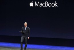 Apple CEO Tim Cook introduces the new Apple MacBook during an Apple event on Monday, March 9, 2015, in San Francisco. (AP Photo/Eric Risberg)